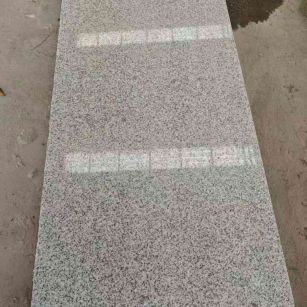 铜陵芝麻白光面毛板